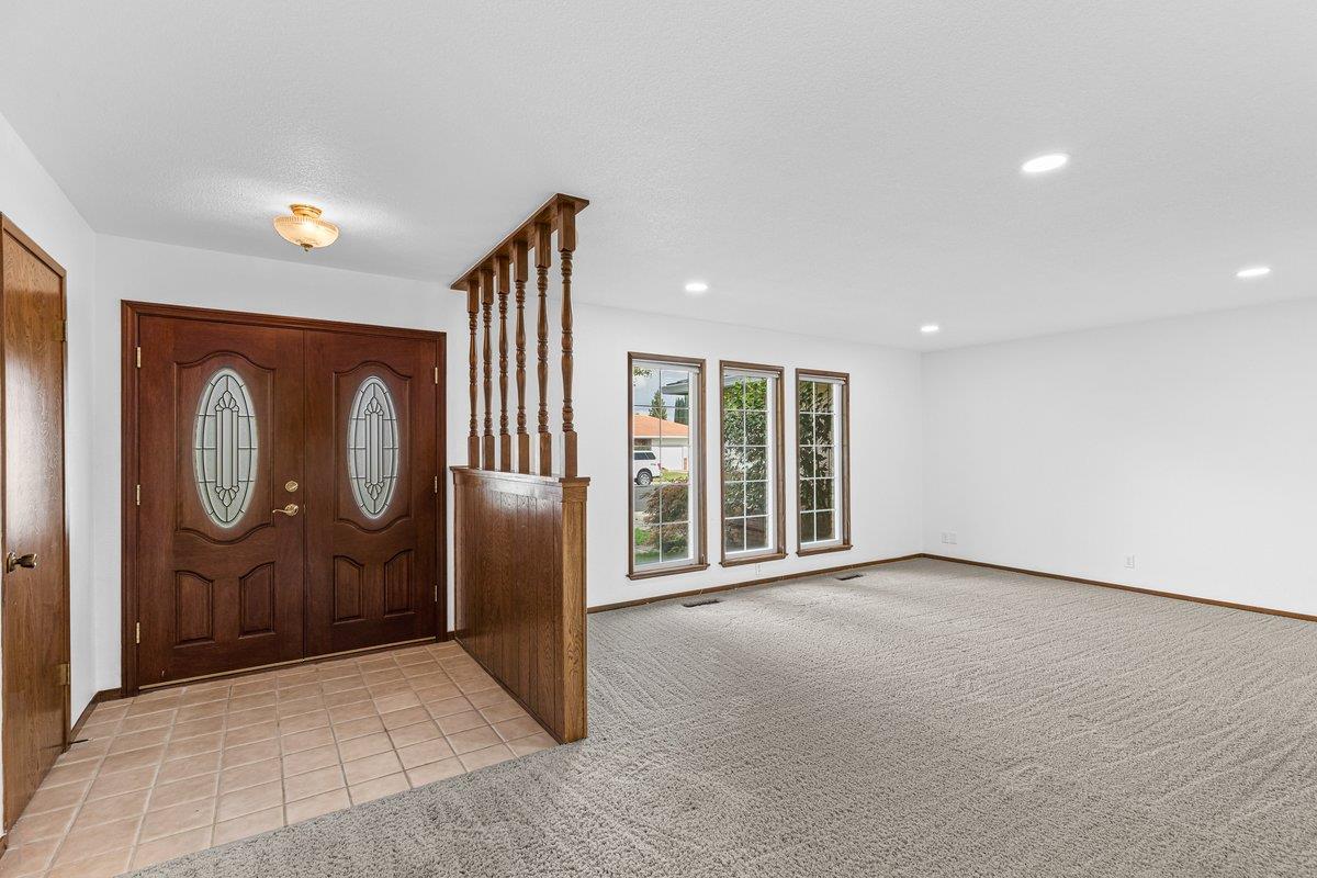 244 California Street Ripon, CA 95366 - Photo 5 of 34 a view of an entryway with wooden door