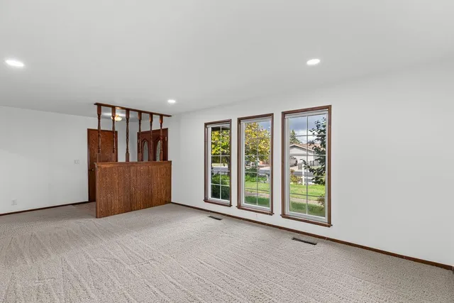 an empty room with windows