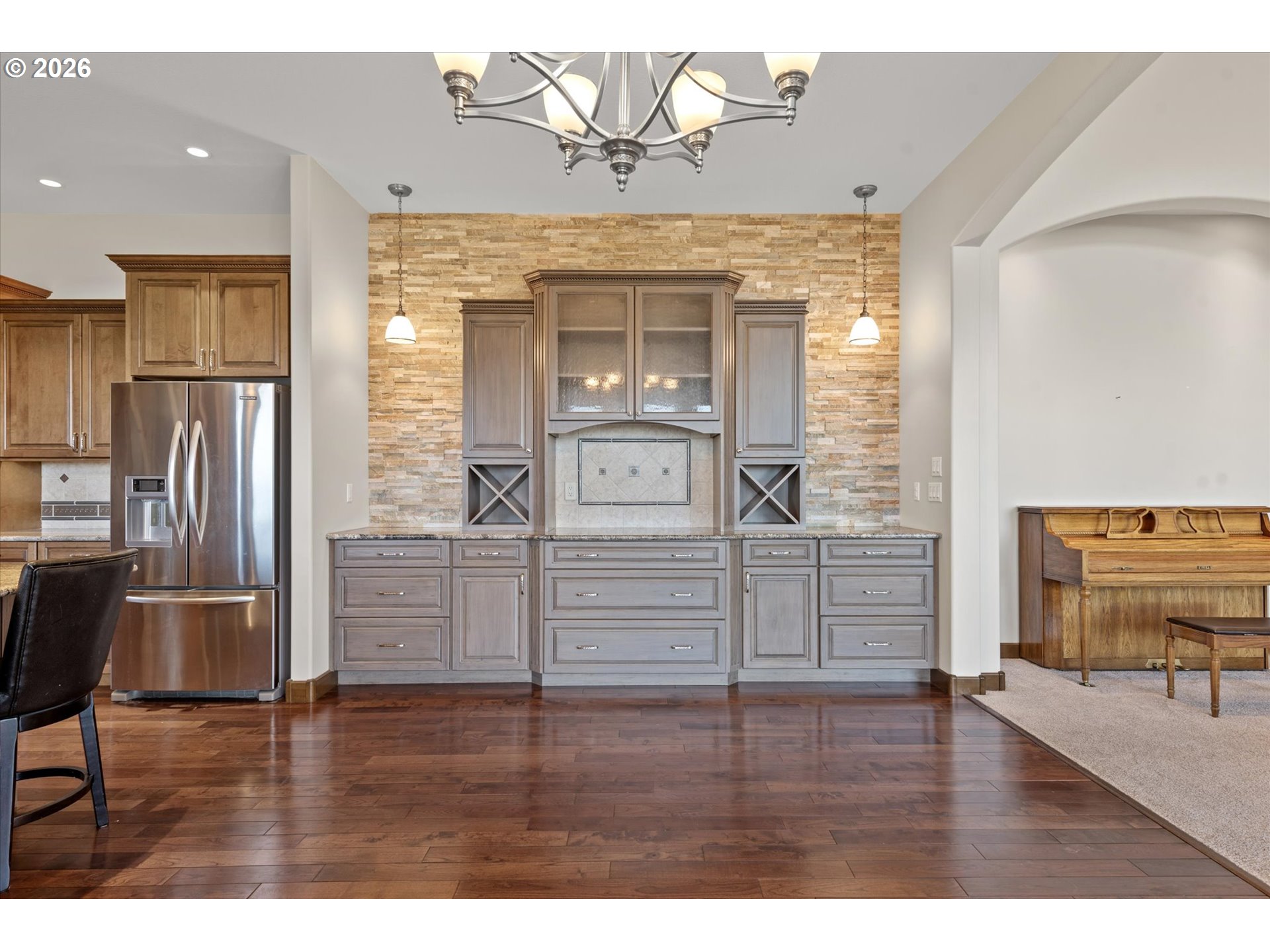121 Ridge Drive La Grande, OR 97850 - Photo 15 of 43 a view of kitchen with stainless steel appliances granite countertop a stove and a refrigerator