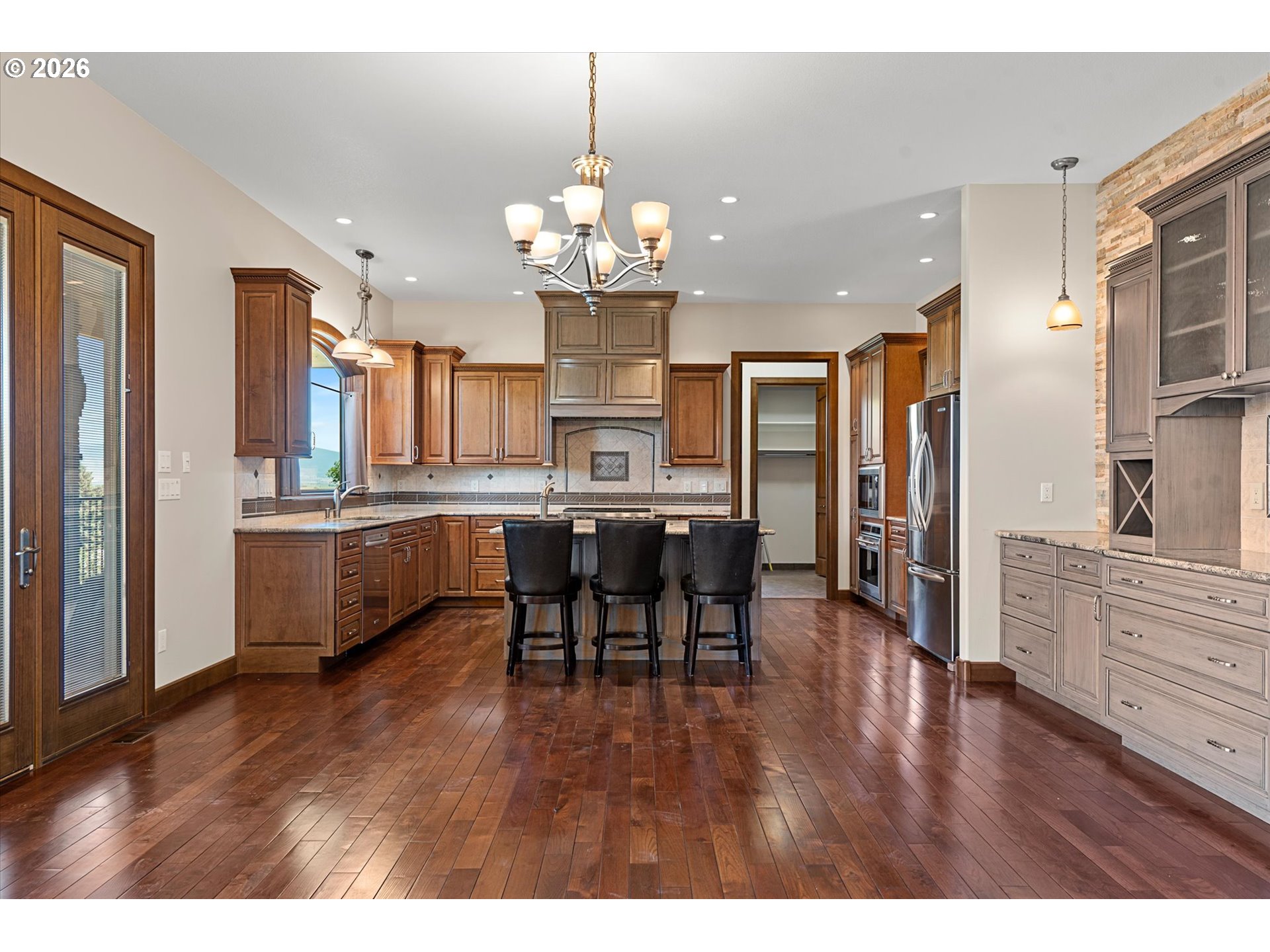 121 Ridge Drive La Grande, OR 97850 - Photo 17 of 43 a view of a dining area kitchen with furniture and stainless steel appliances