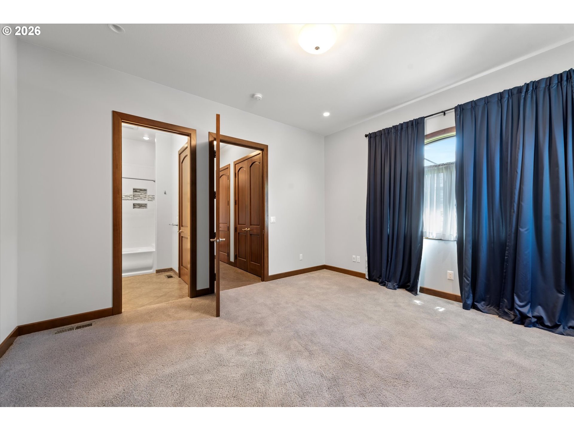 121 Ridge Drive La Grande, OR 97850 - Photo 29 of 43 a view of an empty room with wooden walls