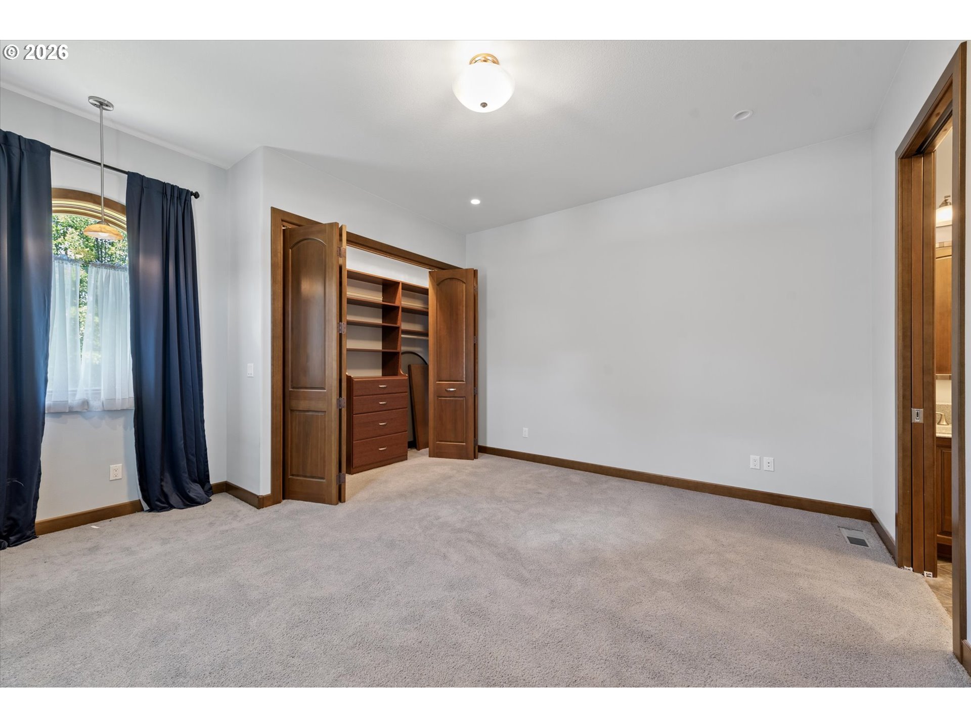 121 Ridge Drive La Grande, OR 97850 - Photo 30 of 43 a view of an empty room with a window