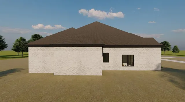 a blue house with a yard in front of it