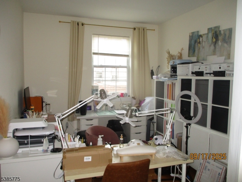 63 Warwick Street Newark, NJ 07105 - Photo 11 of 17 a work place with a desk and chair