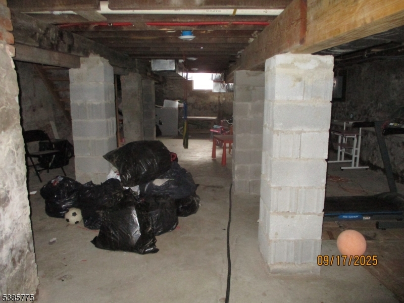 63 Warwick Street Newark, NJ 07105 - Photo 16 of 17 a living room with furniture