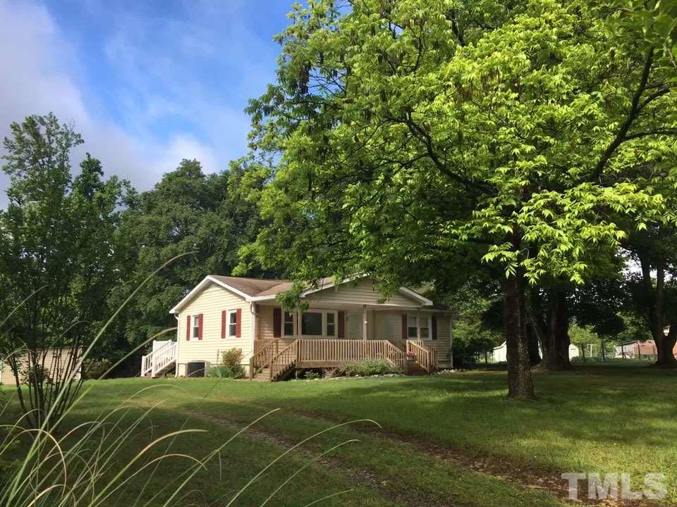 3026 Hamlin Road Durham, NC 27704 - Photo 2 of 15 This lovely cottage welcomes you with a long driveway on each side of the home!