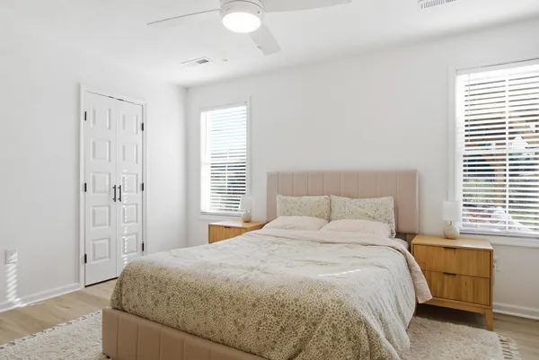 a bedroom with a bed and a view of bathroom