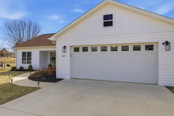 a view of a back yard of the house