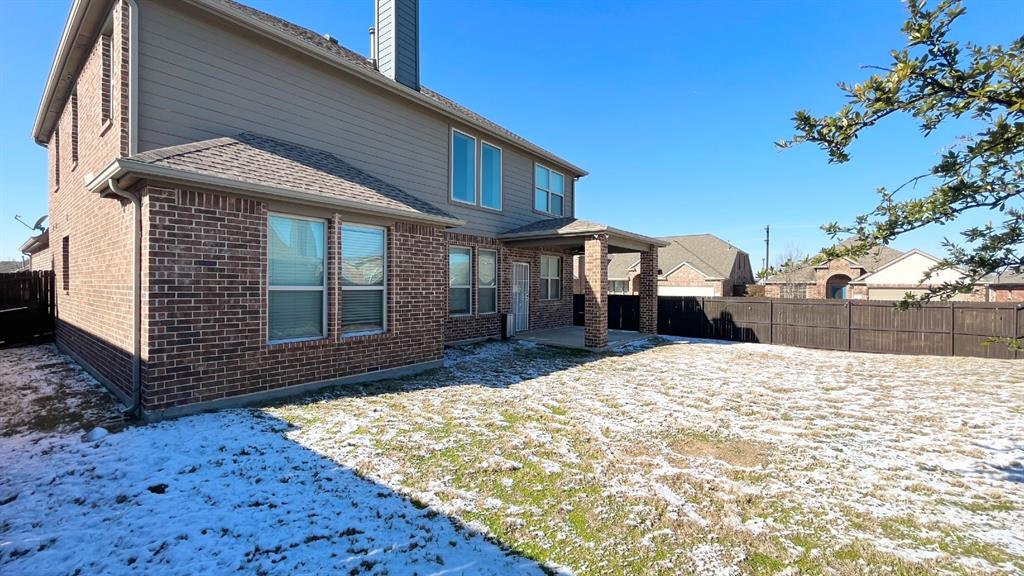 101 Rocky Pine Road McKinney, TX 75072 - Photo 12 of 39 a front view of a house with a yard