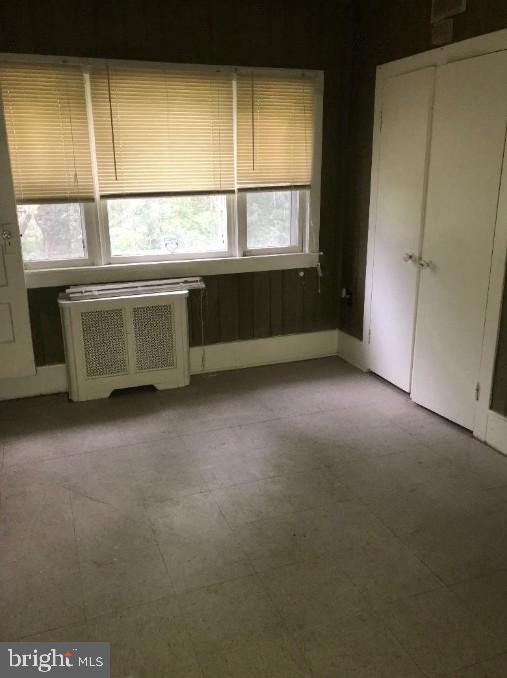 1267 Glassboro Road Williamstown, NJ 08094 - Photo 5 of 8 a view of an empty room with a window