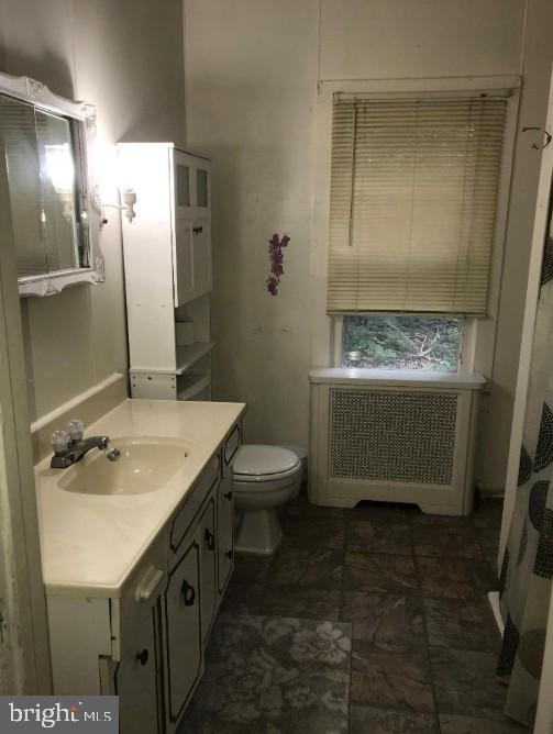 1267 Glassboro Road Williamstown, NJ 08094 - Photo 6 of 8 a bathroom with a sink a toilet and shower