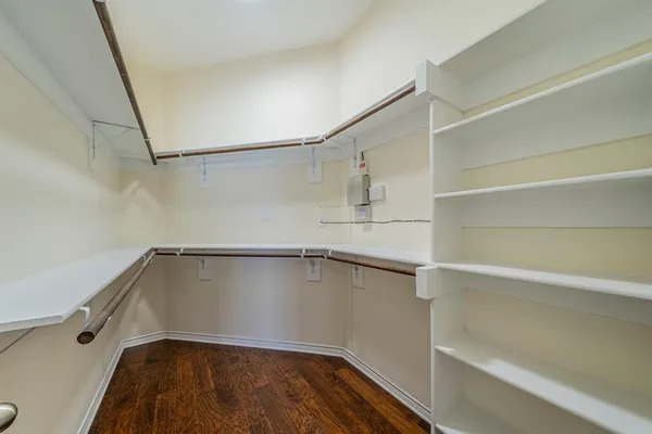 a view of a room with racks on the wall