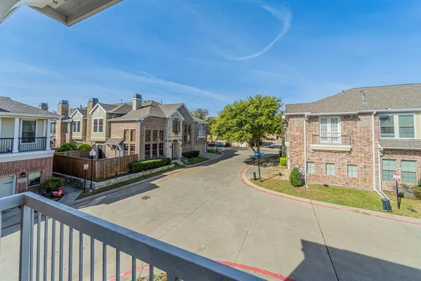 a view of a house with large outdoor space