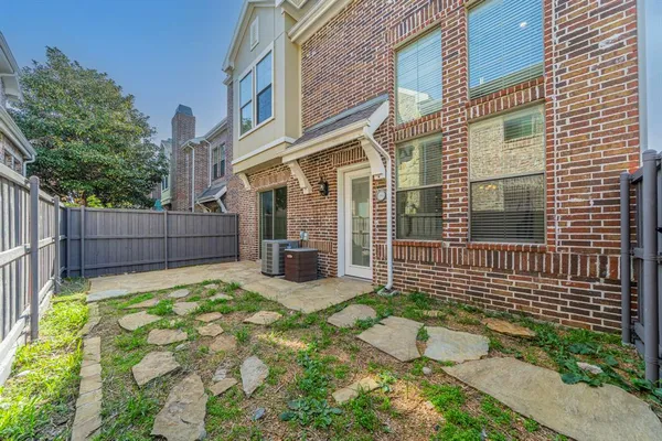 a view of a chair with wooden fence