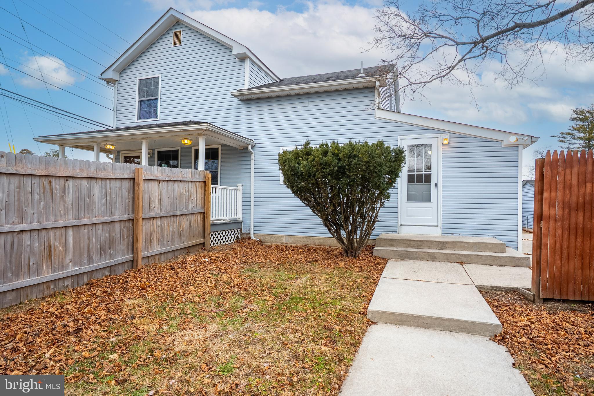 266 Bakers Basin Road Lawrence Township, NJ 08648 - Photo 11 of 32 a front view of a house with a yard