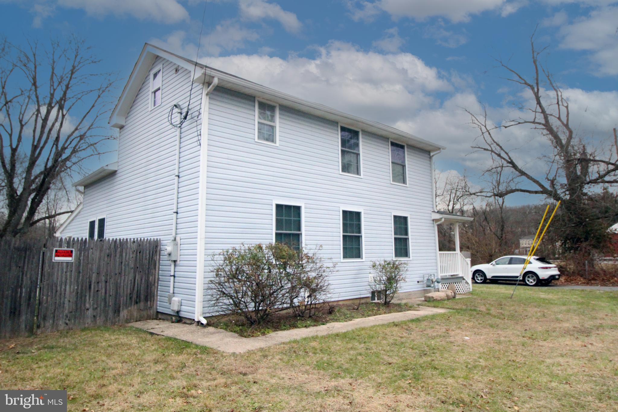 266 Bakers Basin Road Lawrence Township, NJ 08648 - Photo 3 of 32 a view of a car park in front of house