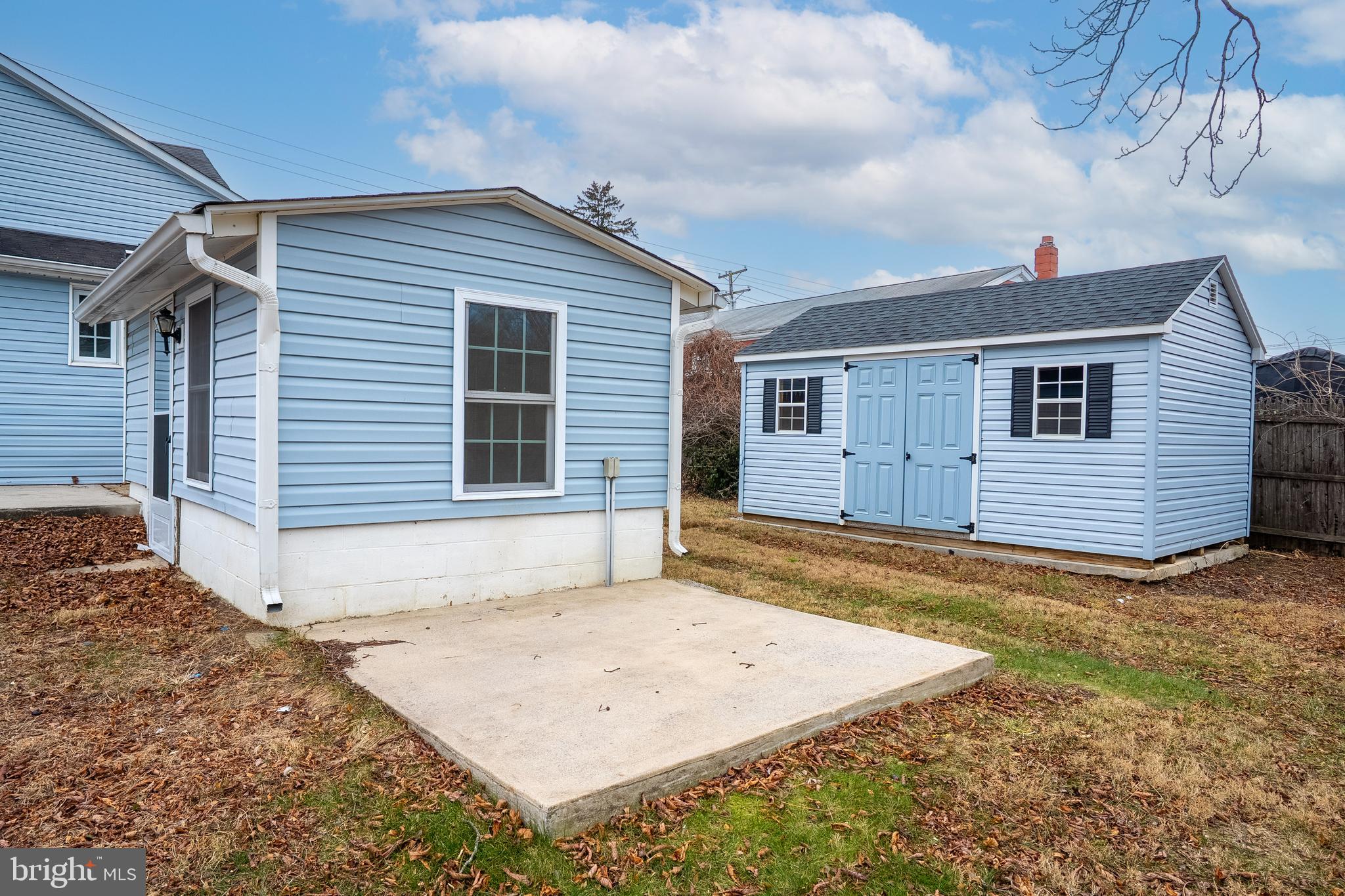 266 Bakers Basin Road Lawrence Township, NJ 08648 - Photo 7 of 32 a view of a backyard with a large tree