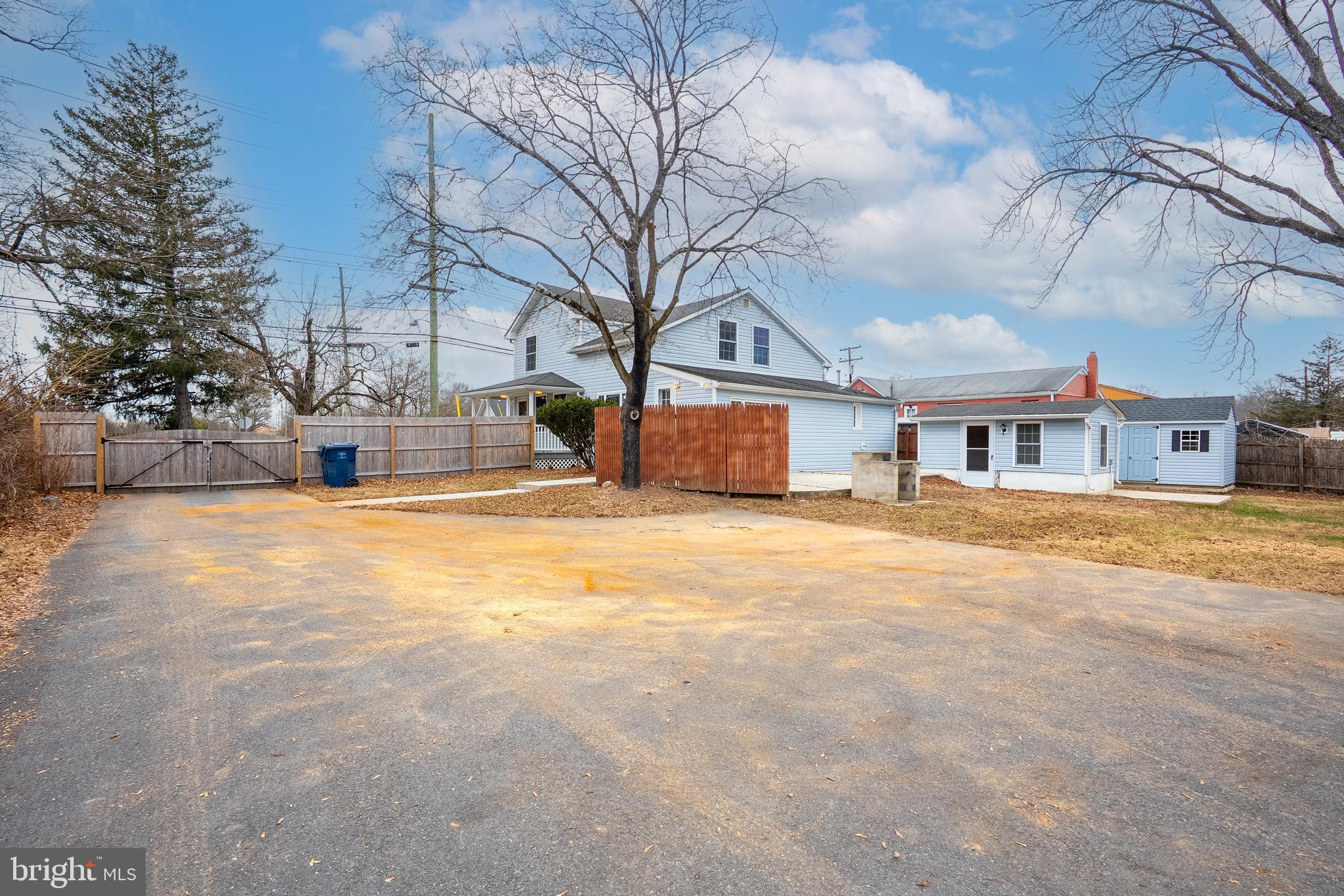 266 Bakers Basin Road Lawrence Township, NJ 08648 - Photo 9 of 32 a front view of a house with a yard