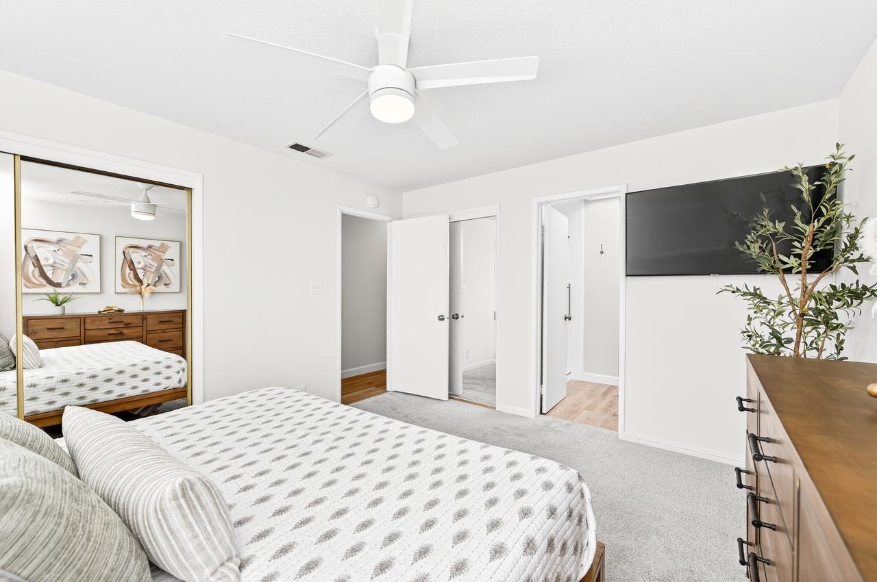 6762 Rancho Court Pleasanton, CA 94588 - Photo 24 of 42 a bedroom with a bed and a flat screen tv