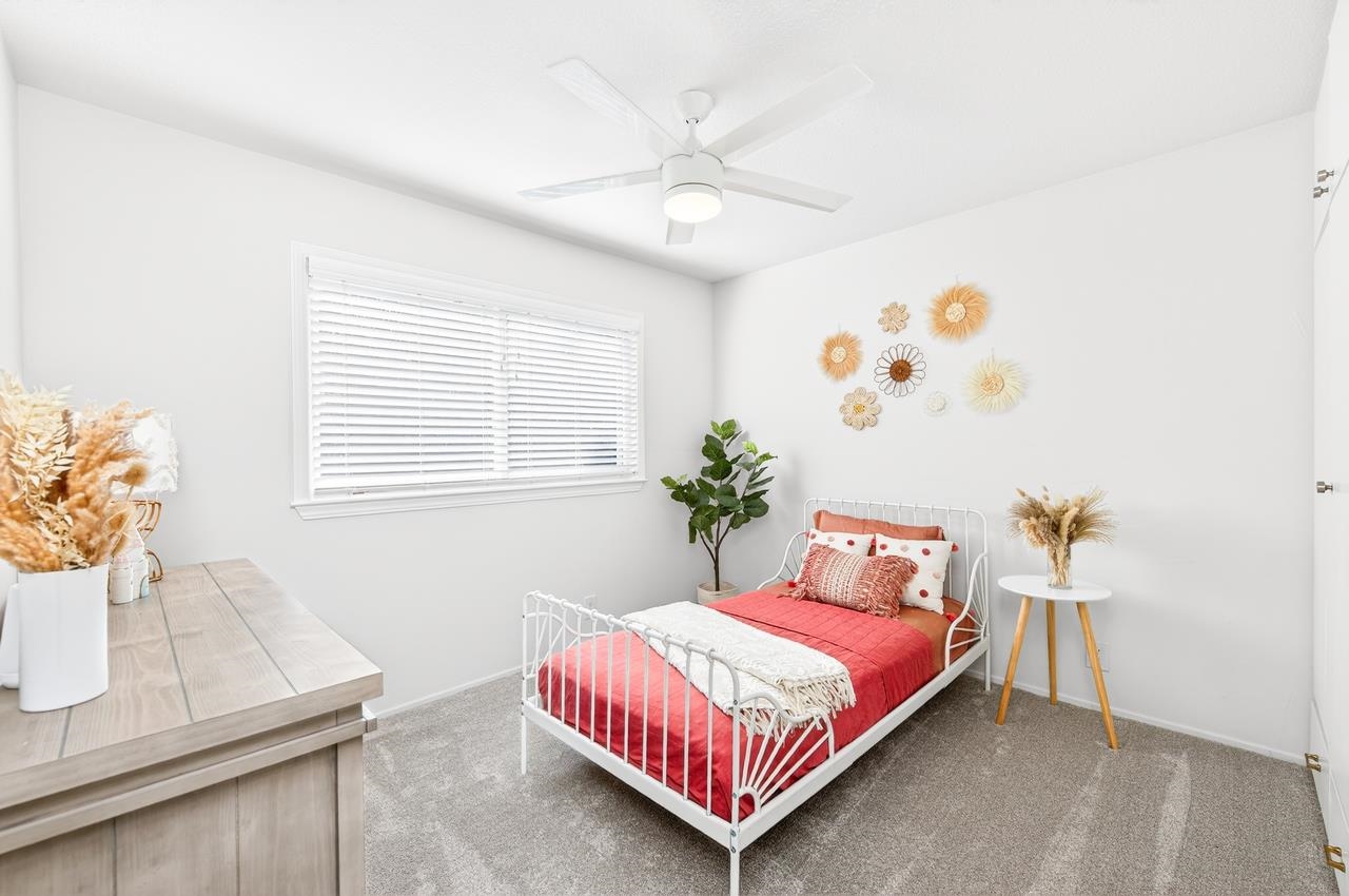 6762 Rancho Court Pleasanton, CA 94588 - Photo 26 of 42 a bedroom with a bed and a window