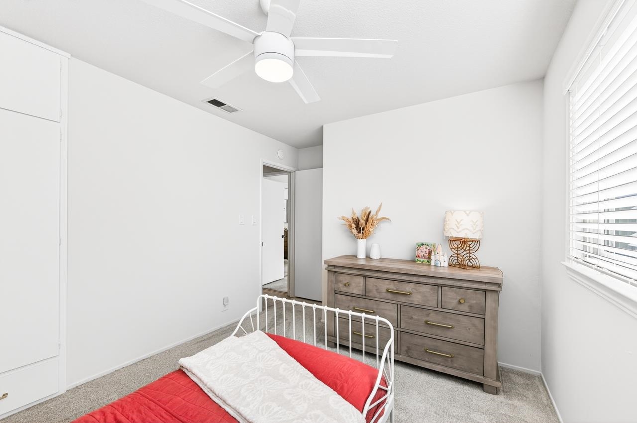 6762 Rancho Court Pleasanton, CA 94588 - Photo 27 of 42 a bedroom with a bed and a dresser