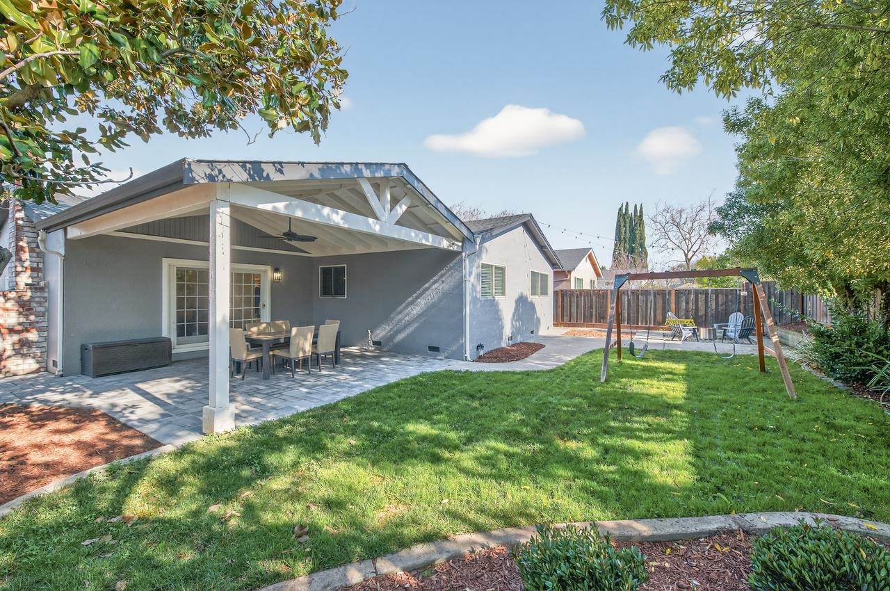 6762 Rancho Court Pleasanton, CA 94588 - Photo 30 of 42 a front view of a house with garden