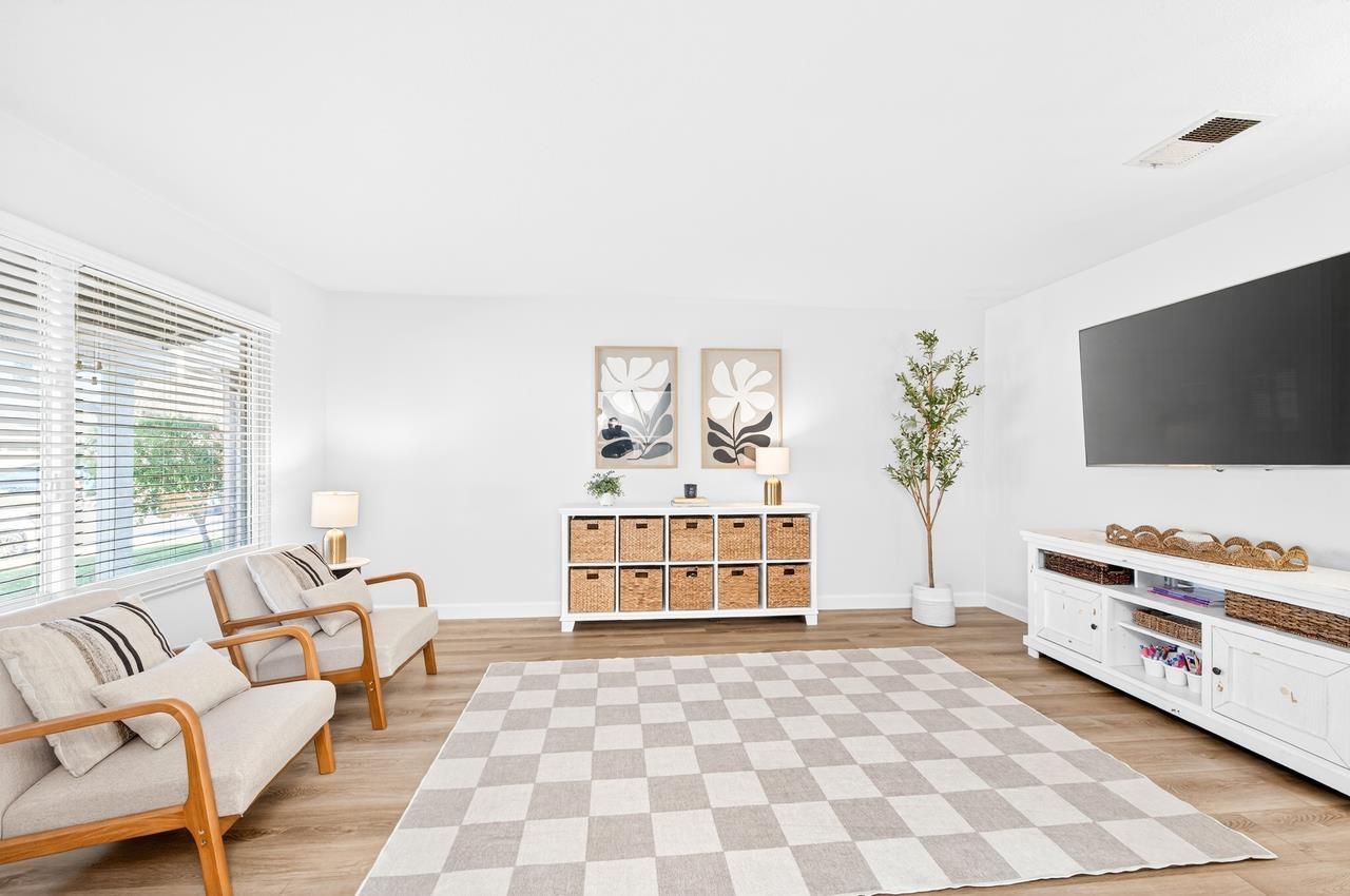 6762 Rancho Court Pleasanton, CA 94588 - Photo 9 of 42 a bedroom with furniture and a flat screen tv