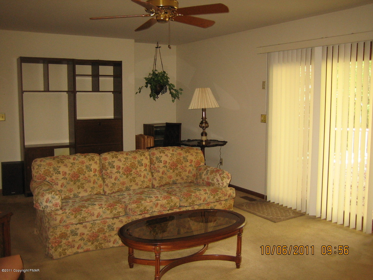 183 Koerners Road Cresco, PA 18326 - Photo 11 of 28 a living room with a couch and a window