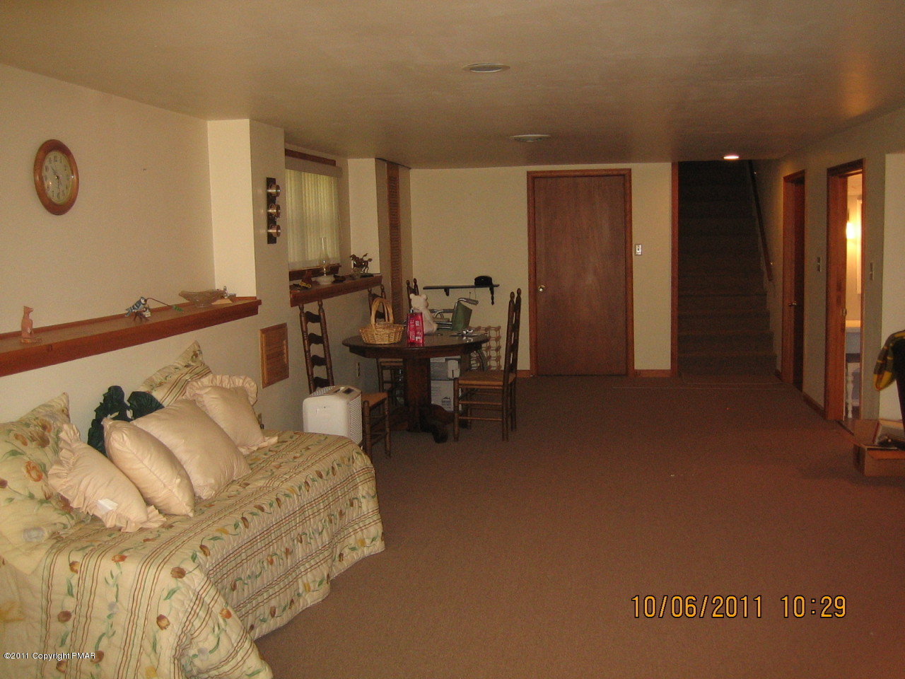 183 Koerners Road Cresco, PA 18326 - Photo 18 of 28 a living room with furniture and a large window
