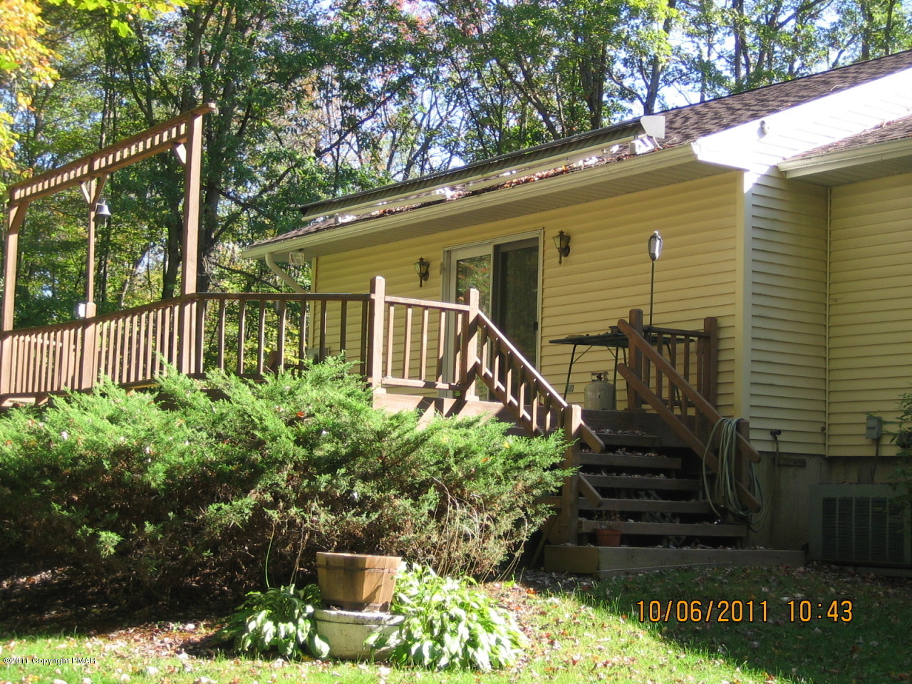 183 Koerners Road Cresco, PA 18326 - Photo 21 of 28 a front view of a house with a yard