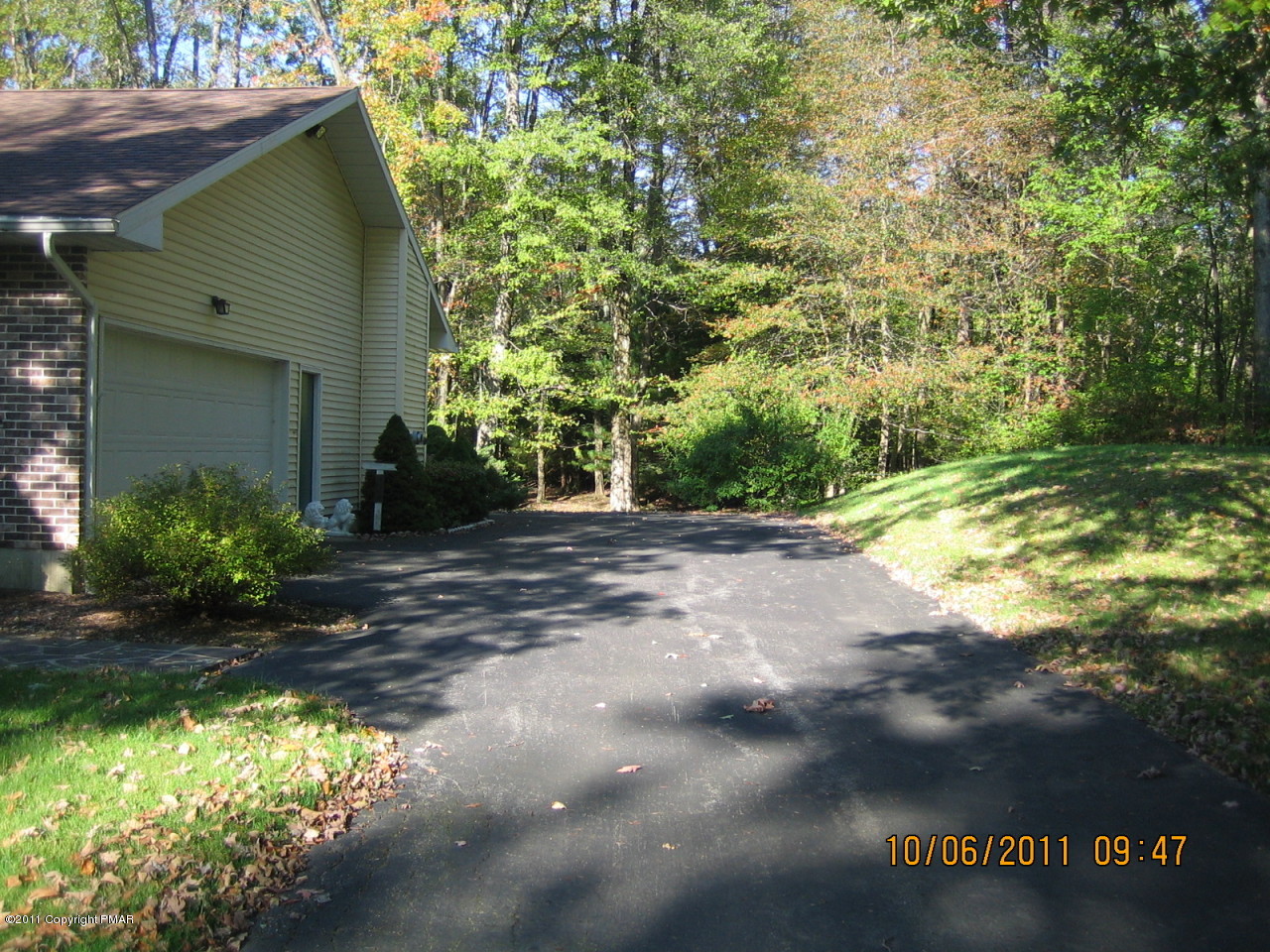 183 Koerners Road Cresco, PA 18326 - Photo 23 of 28 a view of a house with a yard