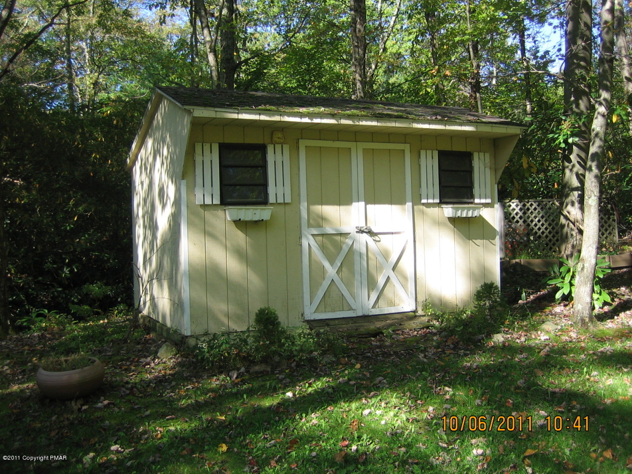 183 Koerners Road Cresco, PA 18326 - Photo 24 of 28 a view of a house with a yard