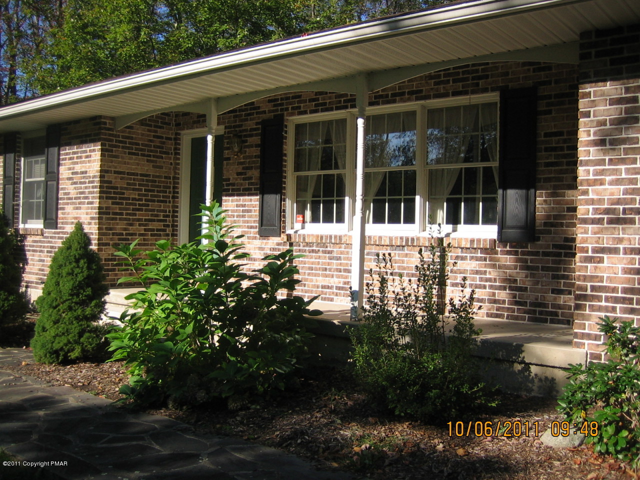 183 Koerners Road Cresco, PA 18326 - Photo 3 of 28 a view of a house with a garden