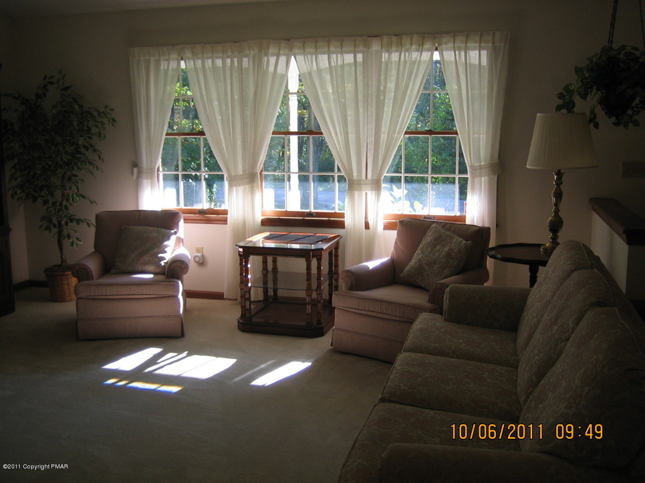 183 Koerners Road Cresco, PA 18326 - Photo 5 of 28 a living room with furniture and a large window