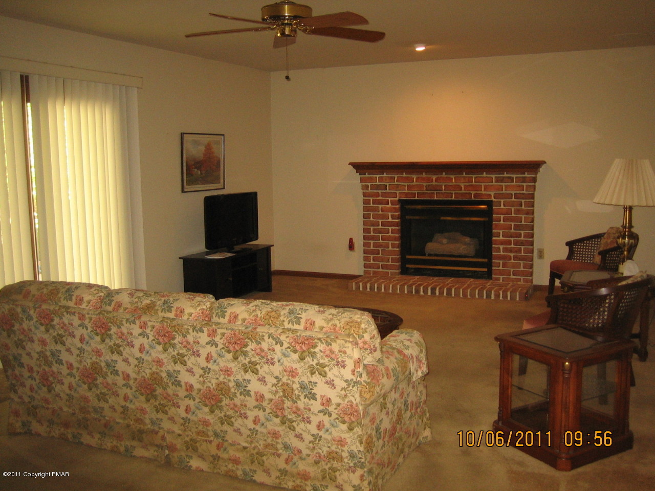 183 Koerners Road Cresco, PA 18326 - Photo 10 of 28 a bedroom with a bed and a fireplace