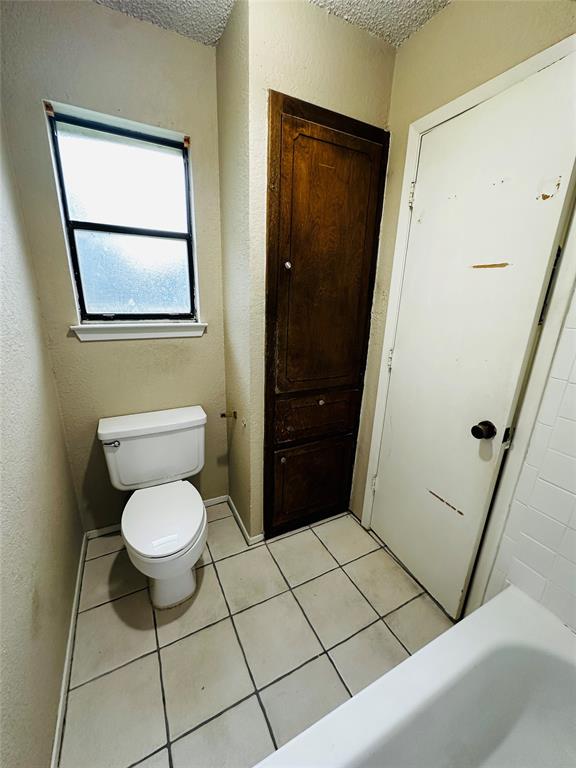6741 Ridgetop Road North Richland Hills, TX 76182 - Photo 35 of 40 Primary bath with storage