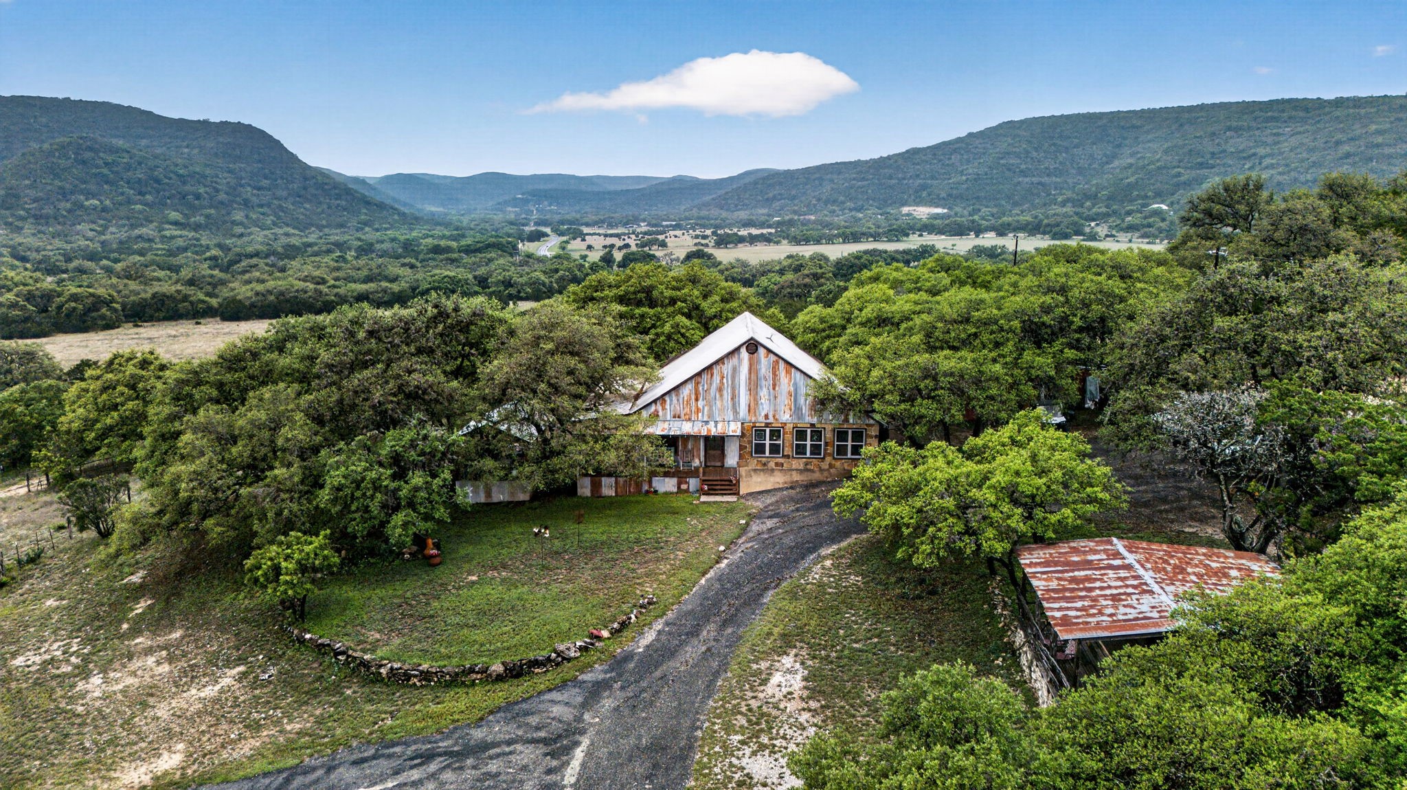 1850 Ranch Road 337 Leakey, TX 78873 - Photo 6 of 50 Aerial view showcasing usable acreage, natural landscape, and peaceful Hill Country setting