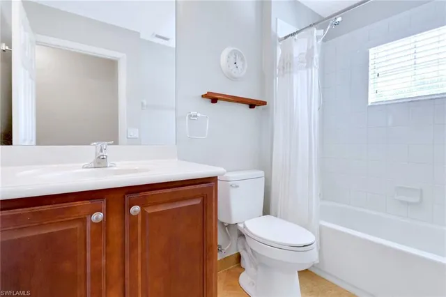 a view of swimming pool with a patio