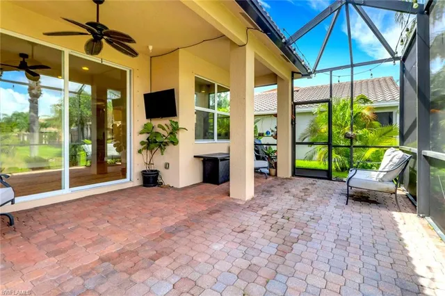 a view of swimming pool with a patio and a garden