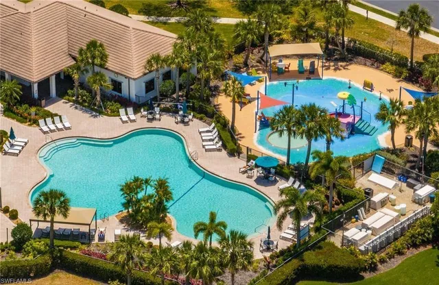 a view of a balcony with furniture and a rug