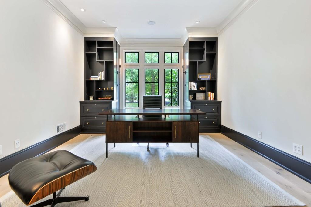 3303 Habersham Road Northwest Atlanta, GA 30305 - Photo 16 of 63 a living room with furniture and a large window
