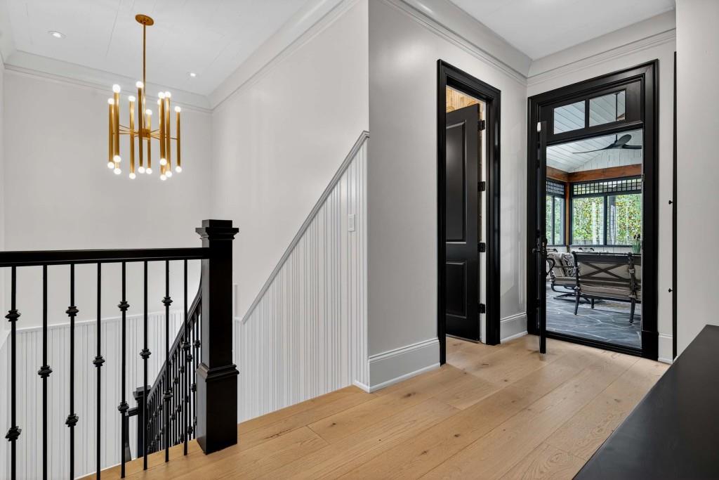 3303 Habersham Road Northwest Atlanta, GA 30305 - Photo 20 of 63 a view of an entryway with wooden floor and livingroom
