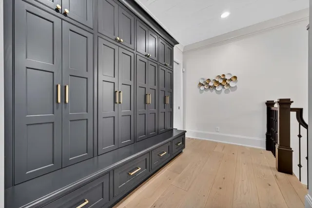 a living room with fireplace furniture and a fireplace