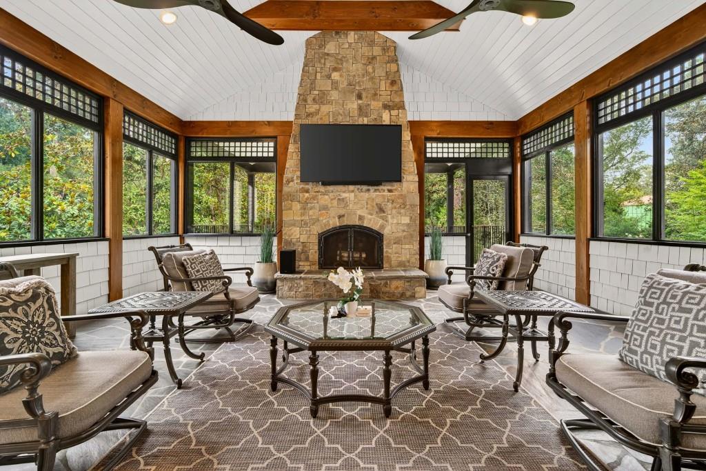 3303 Habersham Road Northwest Atlanta, GA 30305 - Photo 24 of 63 a living room with fireplace furniture and a fireplace