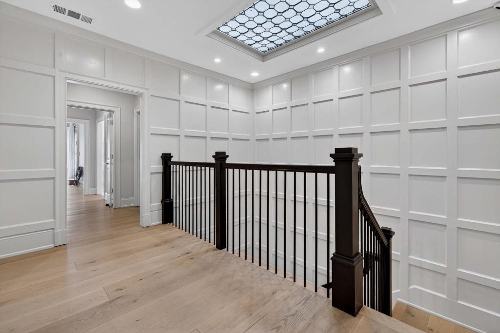 3303 Habersham Road Northwest Atlanta, GA 30305 - Photo 25 of 63 a view of a hallway with wooden floor