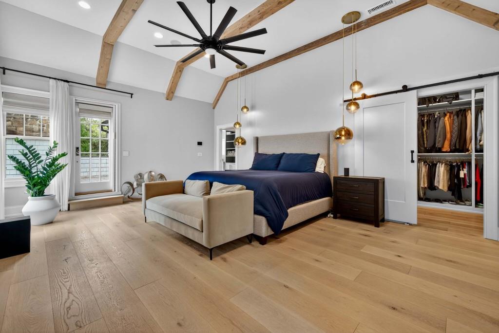 3303 Habersham Road Northwest Atlanta, GA 30305 - Photo 26 of 63 a spacious bedroom with a bed couch and a window