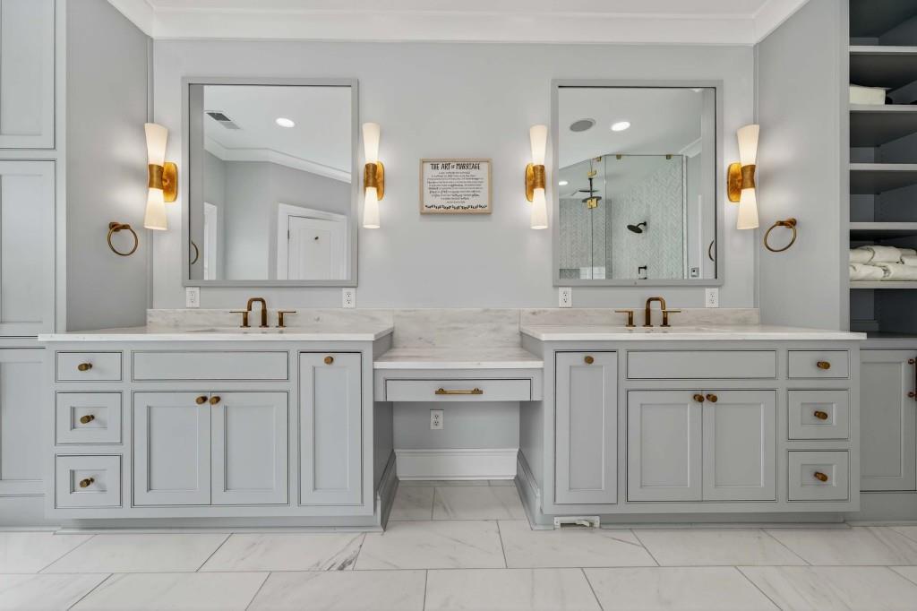3303 Habersham Road Northwest Atlanta, GA 30305 - Photo 29 of 63 a bathroom with a sink vanity and mirror