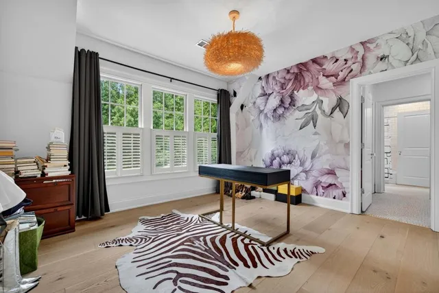 a view of front door with wooden floor
