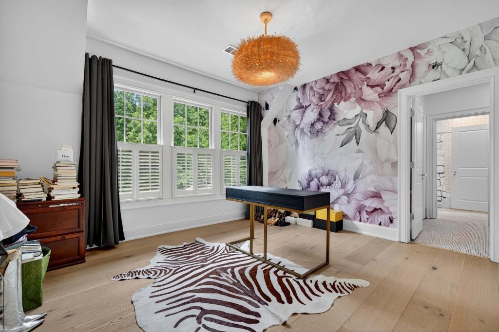 3303 Habersham Road Northwest Atlanta, GA 30305 - Photo 37 of 63 a bedroom with furniture and a window