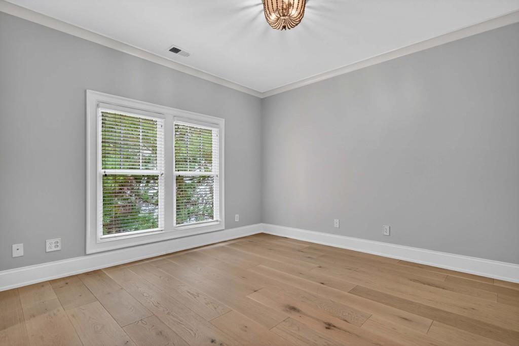 3303 Habersham Road Northwest Atlanta, GA 30305 - Photo 39 of 63 wooden floor and window in an empty room
